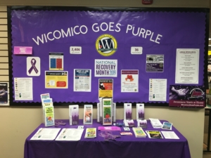 Our Wicomico Goes Purple table at the Wicomico County Library for Recovery Month
